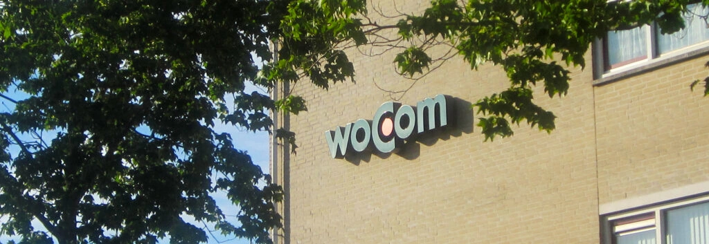 woCom wand logo